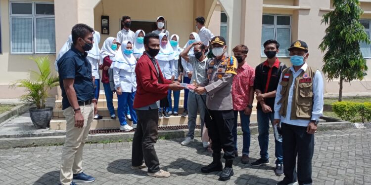Silaturahmi ke Universitas Pahlawan T. Tambusai, Kapolres Kampar Bagikan Masker Untuk Mahasiswa