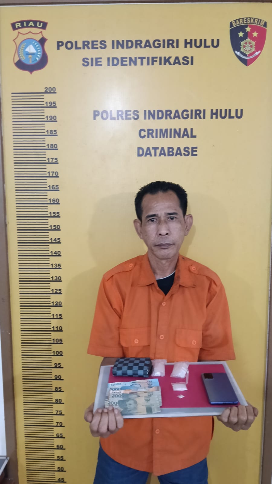 Markas Narkoba Dipondok Jalan Narasinga Rengat Digrebek Polisi, Dua Tersangka Diborgol