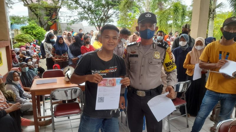 Polsek Tandun laksanakan giat bantuan tunai pangan Polda Riau kepada masyarakat kecamatan Tandun