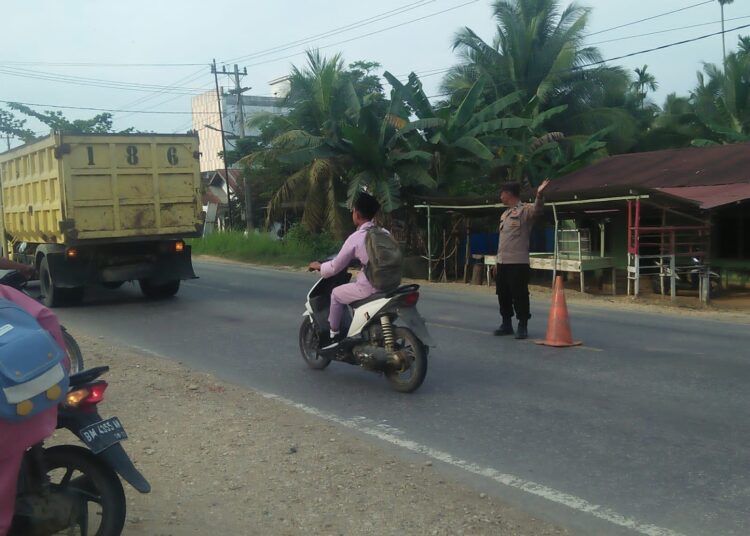 Polsek Pangkalan Lesung Pengaturan Lalulintas di Lokasi Rawan Lakalantas