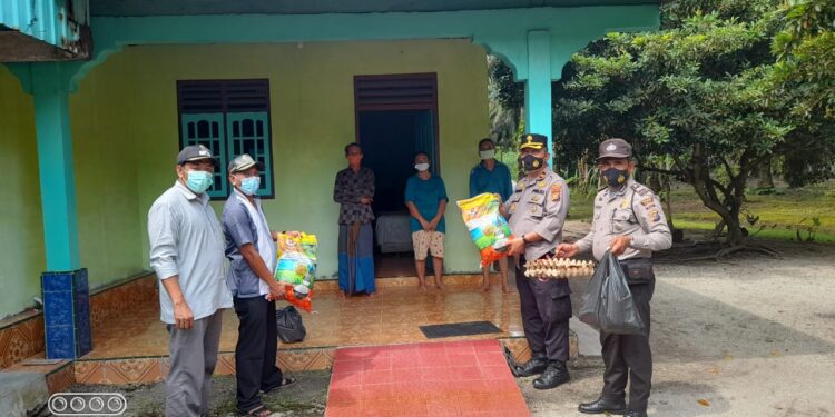 Kapolsek Tapung Lakukan Monitoring, Pantau Perkembangan Warga Yang Isolasi Mandiri