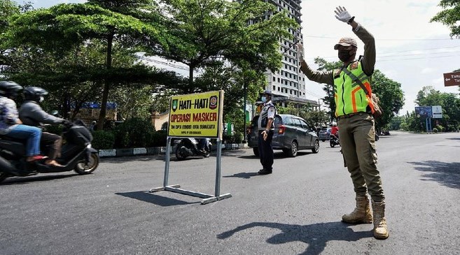 Belasan Orang Terjaring Razia Masker