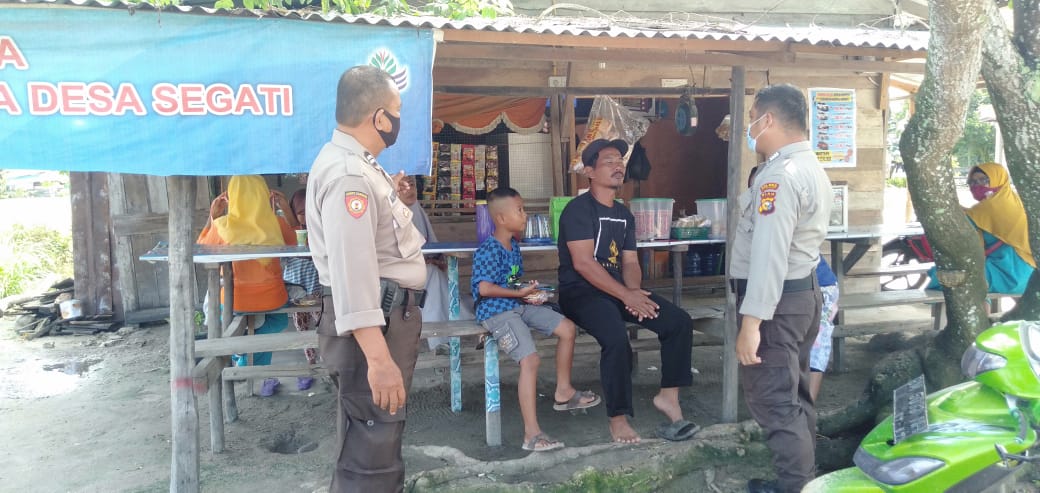 Polsek Langgam Gencarkan Patroli dan Sosialisasi Pencegahan Covid-19