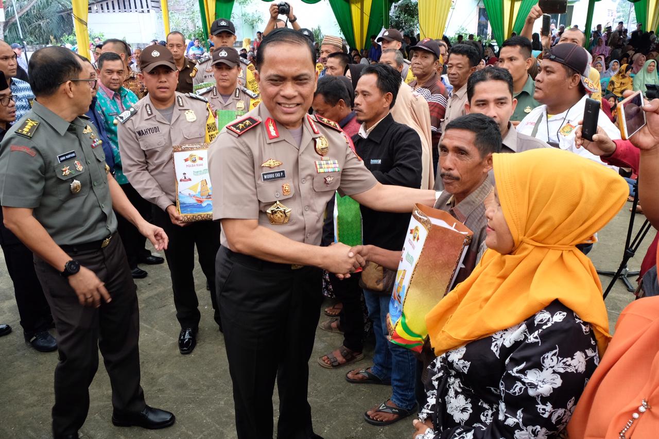 Polda Riau Gelar Kegiatan Bakti Kesehatan dan Pembagian Sembako Gratis di Kec. Tambang, Kab. Kampar