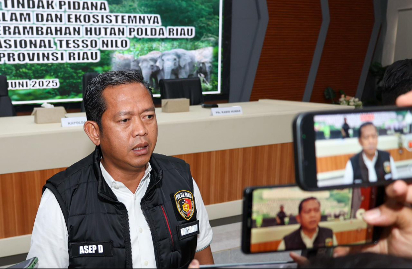 Polda Riau Tangkap Dua Tersangka Transportir PMI Ilegal dari Malaysia
