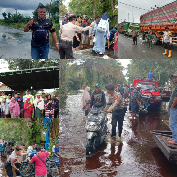 Personil Polres Pelalawan Cooling System, Bantu Warga Terdampak Banjir & Atur Lalin Area Banjir KM 74 Sampai KM 83