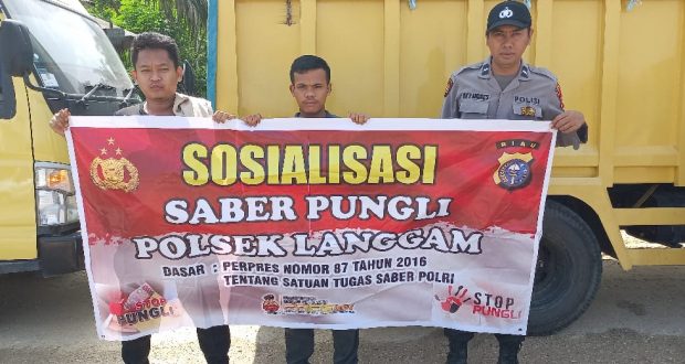 Sosialisasi Saber Pungli Polsek Langgam Kepada Masyarakat