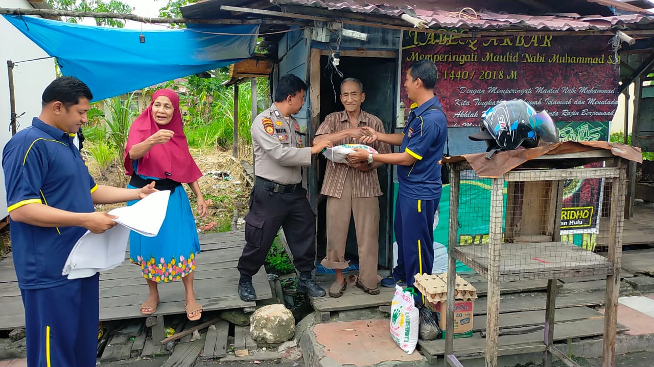 Polsek Bangko Laksanakan Jumat Berkah Di pangkalan Becak Simpang Benar