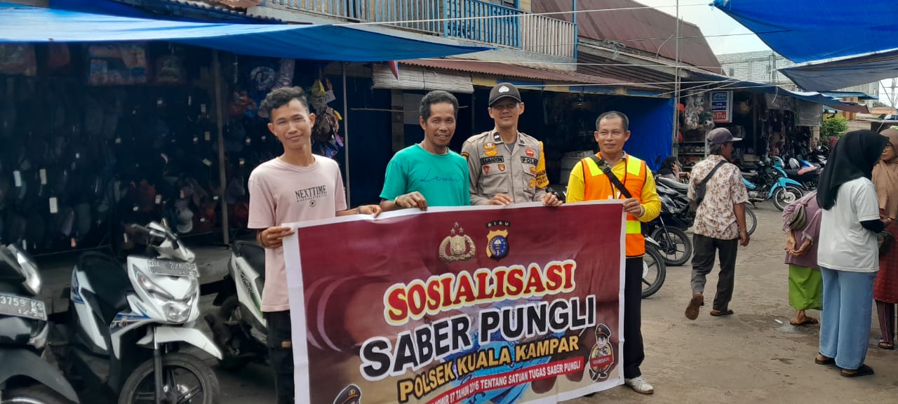 Polsek Kuala Kampar Gencar Sosialisasi Saber Pungli di Parkiran Pasar