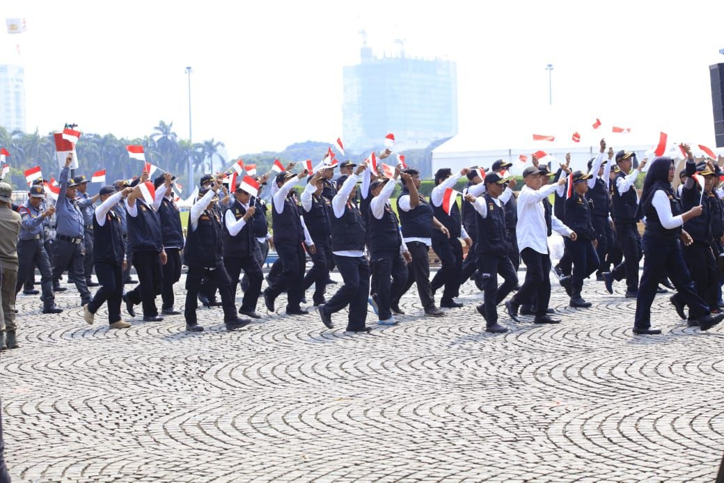 Satpam dan Potmas Ikut Ambil Bagian dalam Devile Hari Bhayangkara ke-79 di Monas 