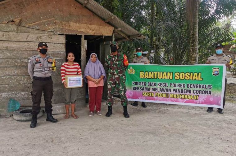 Polres Bengkalis Kembali Berikan Bansos untuk Warga Terdampak Covid-19