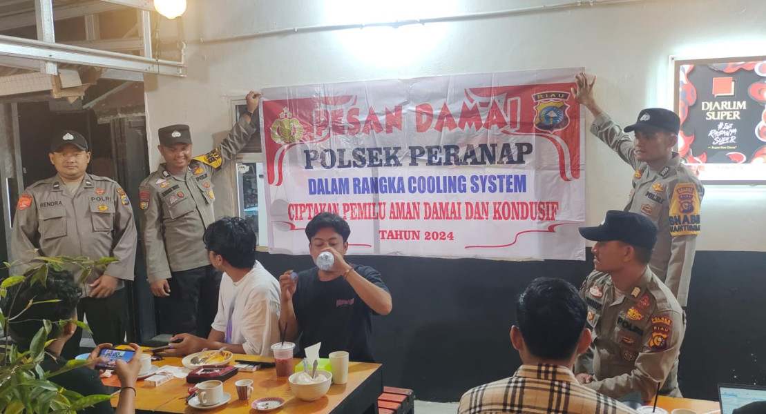 Sosialisasi Pilkada Damai, Kapolsek Peranap Gerilya di Warung Kopi