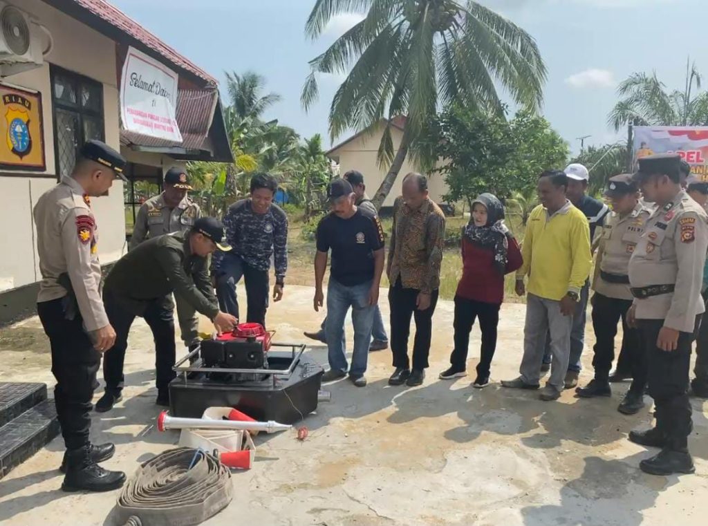 BANGUN SINERGI FORKOPOMCAM ENOK GELAR APEL SIMULASI CEGAH KARHUTLA.