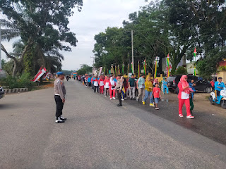 Kapolsek Pangkalan Lesung Lakukan Pengamanan Kegiatan Jalan Santai