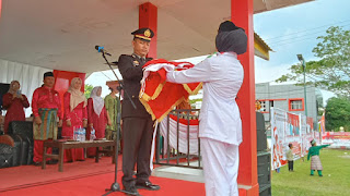 Kapolsek Teluk Meranti Jadi Irup Upacara Penurunan Bendera HUT RI ke-79 Tingkat Kecamatan 