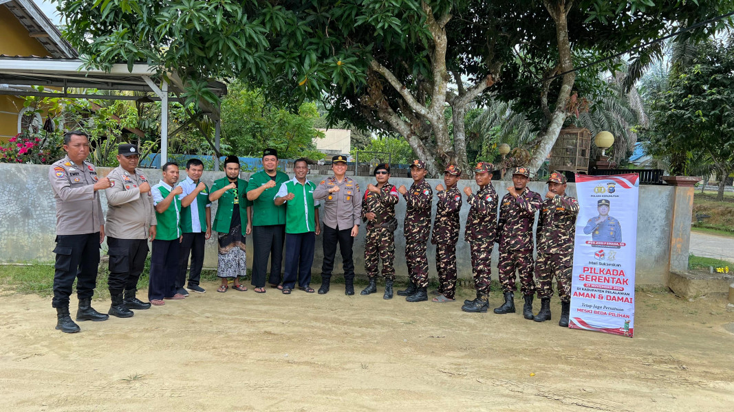 Kapolsek Kerumutan Bersama GP Ansor dan Banser Jaga Kondusifitas Pilkada Serentak 2024